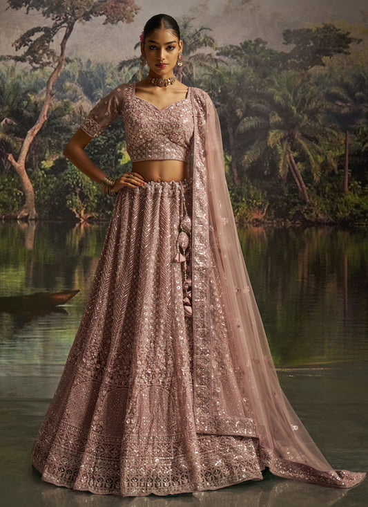 Delicate Peach Soft Embroidered Net Designer Wedding Lehenga Choli Set