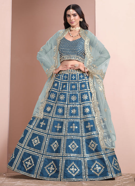 peacock blue art silk embroidered lehenga choli with net dupatta