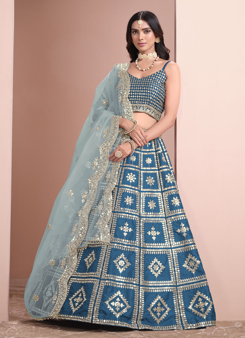 peacock blue art silk embroidered lehenga choli with net dupatta