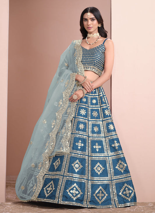 peacock blue art silk embroidered lehenga choli with net dupatta