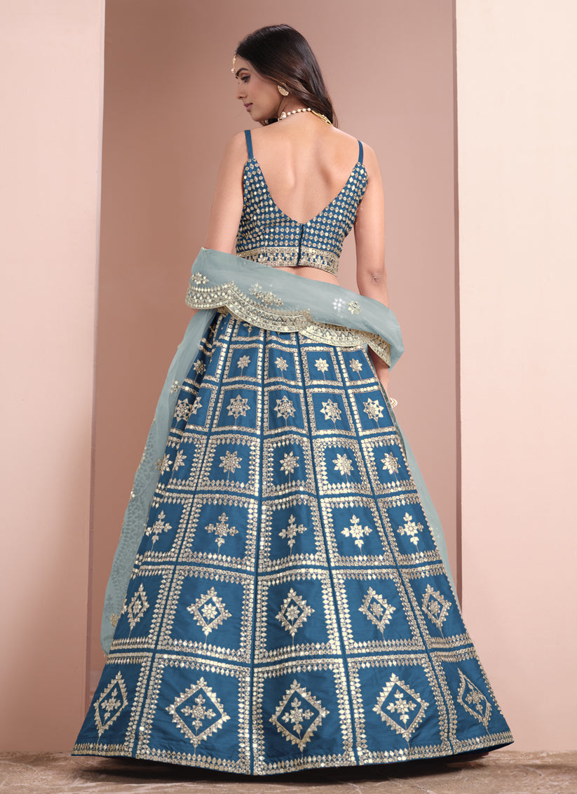 peacock blue art silk embroidered lehenga choli with net dupatta