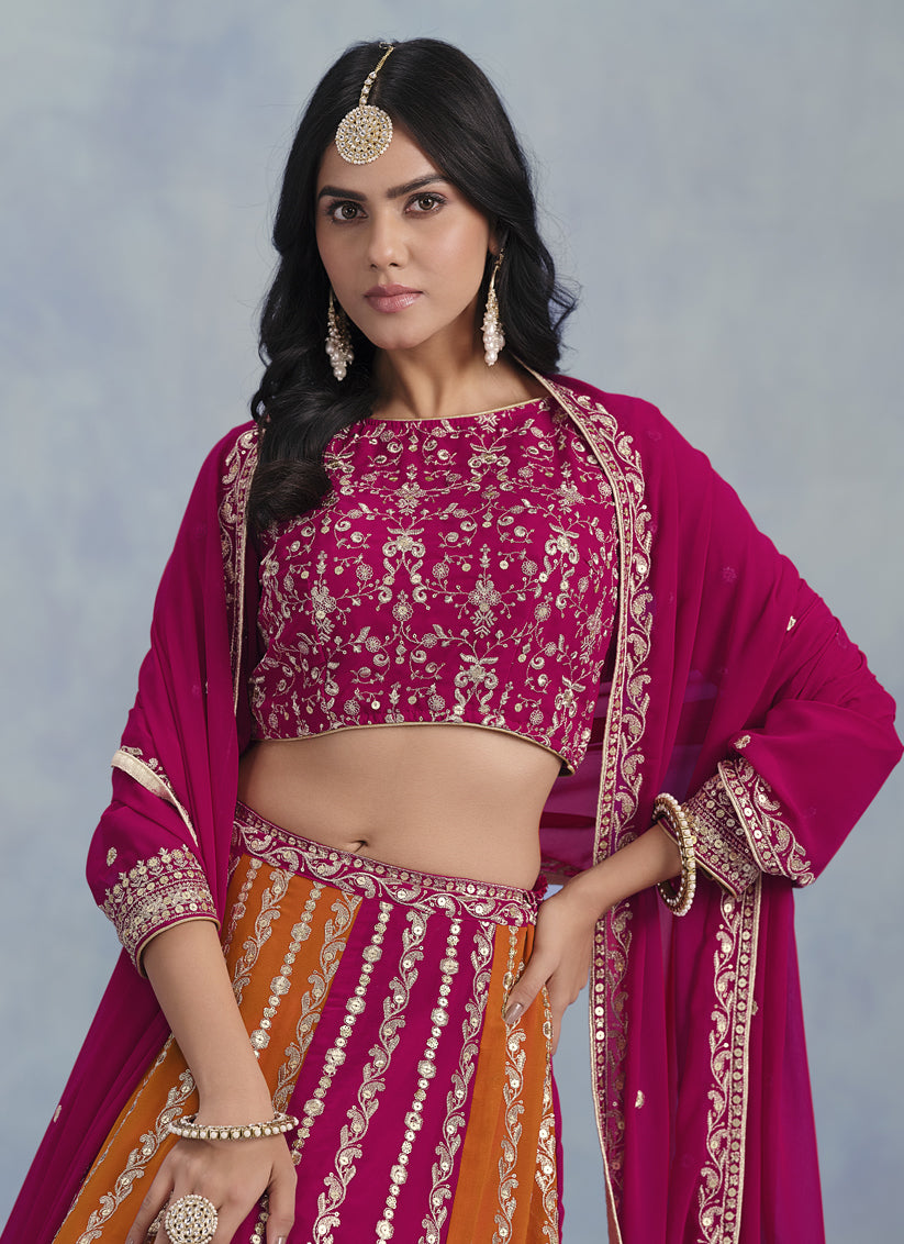 magenta and tangerine faux georgette embroidered lehenga choli