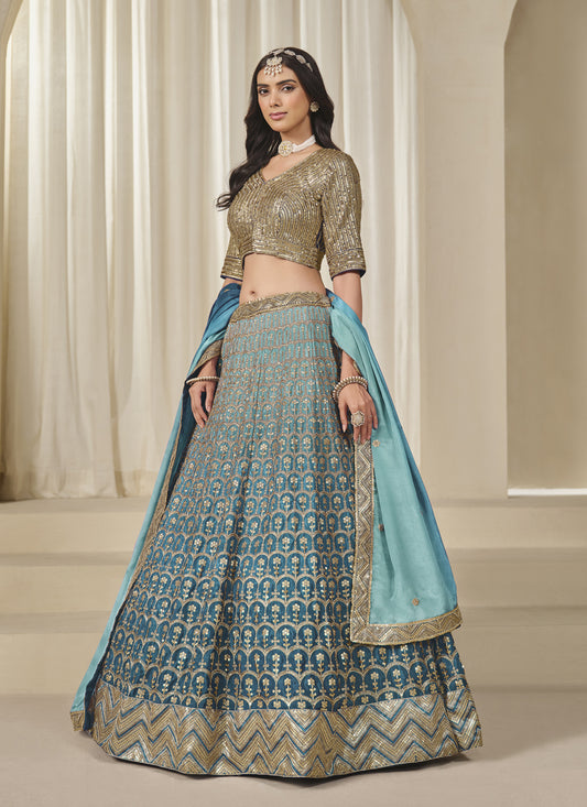 Bewitching Teal Blue Heavy Embroidered Premium Chinnon Silk Lehenga Choli Set
