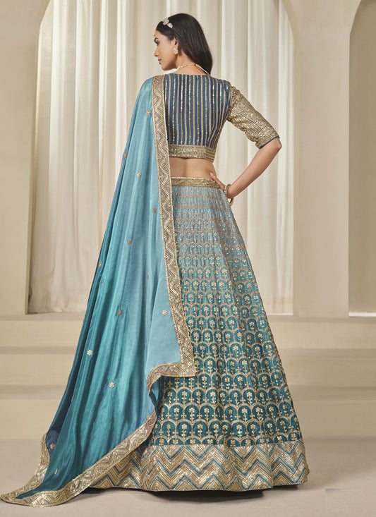 Bewitching Teal Blue Heavy Embroidered Premium Chinnon Silk Lehenga Choli Set