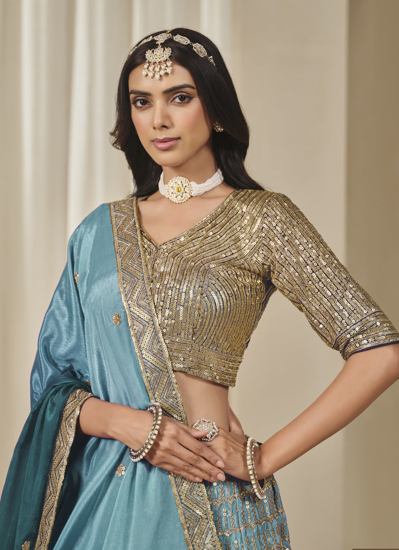 Bewitching Teal Blue Heavy Embroidered Premium Chinnon Silk Lehenga Choli Set