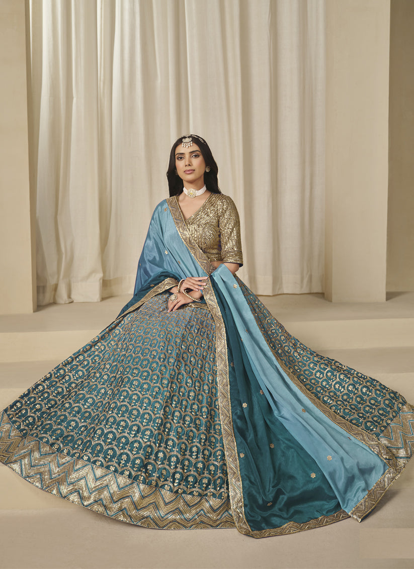 Bewitching Teal Blue Heavy Embroidered Premium Chinnon Silk Lehenga Choli Set