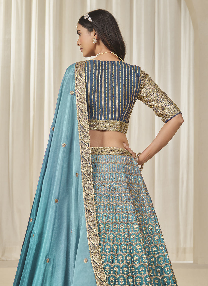 Bewitching Teal Blue Heavy Embroidered Premium Chinnon Silk Lehenga Choli Set