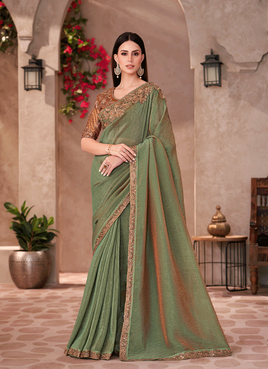 Impeccable Sauf Green Georgette Heavy Designer Saree