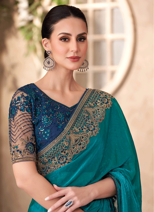 Graceful Peacock Blue Satin Georgette Heavy Designer Saree