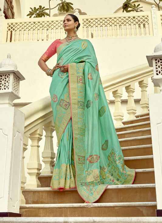 Charismatic Turquoise Dola Silk Handwork Wedding Saree