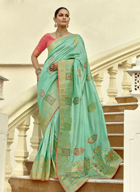 Charismatic Turquoise Dola Silk Handwork Wedding Saree