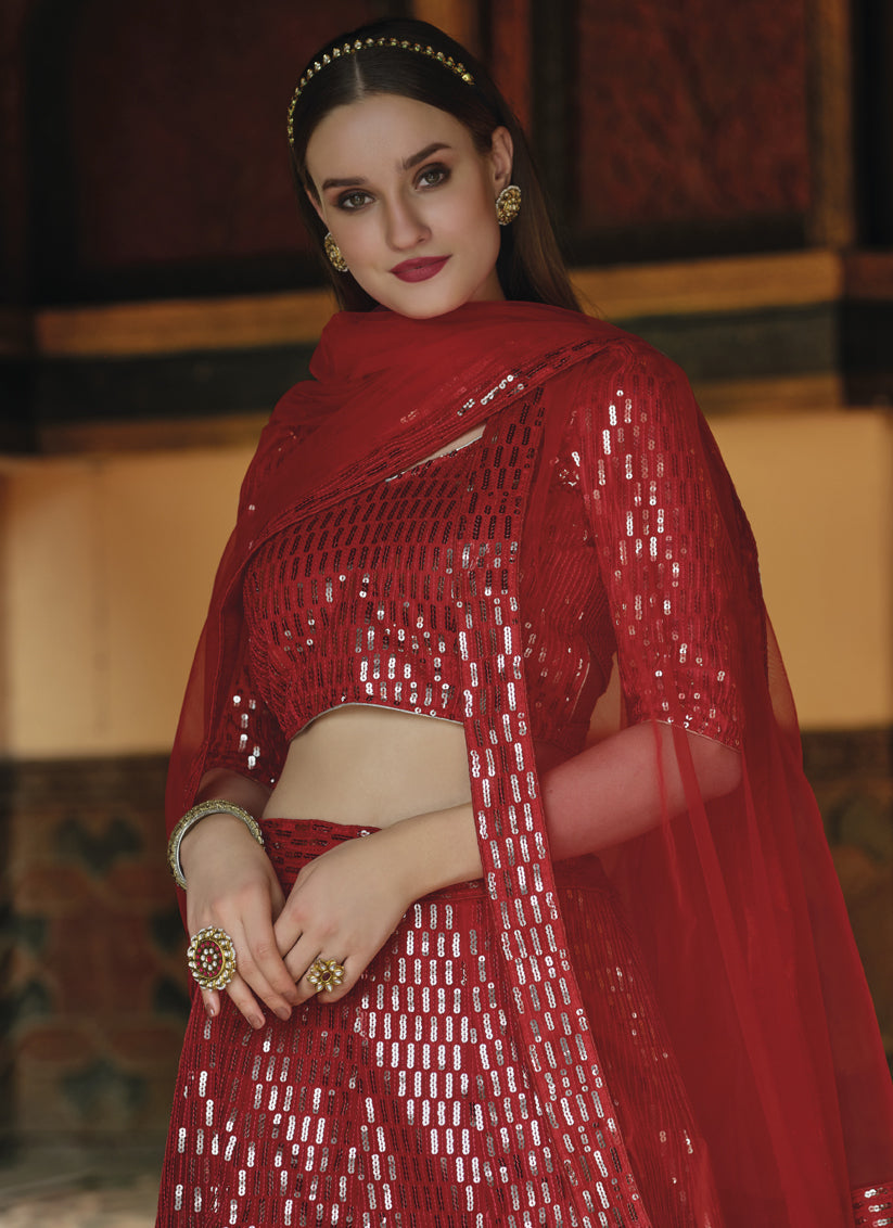 Trendsetting Rust Red Net Sequins Designer Lehenga Choli