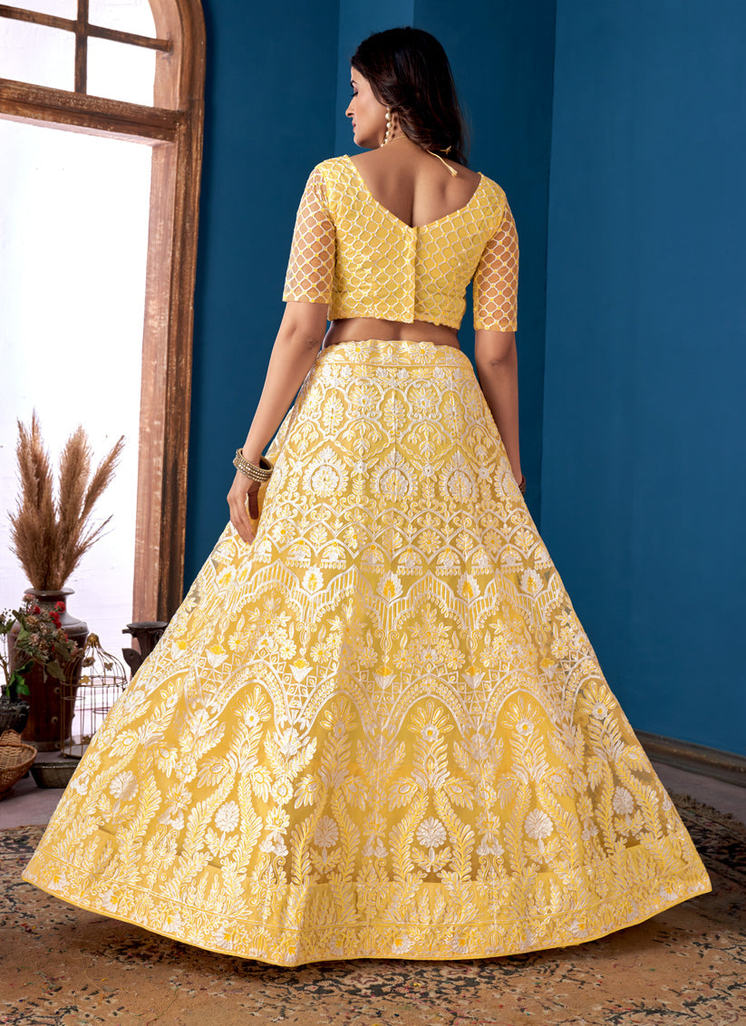 Lemon Yellow Net Embroidered Wedding Wear Lehenga Choli