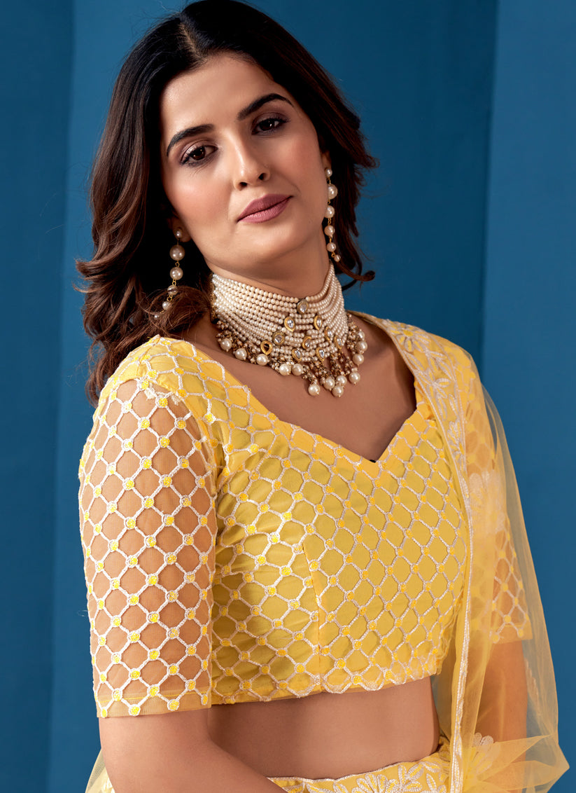 Lemon Yellow Net Embroidered Wedding Wear Lehenga Choli