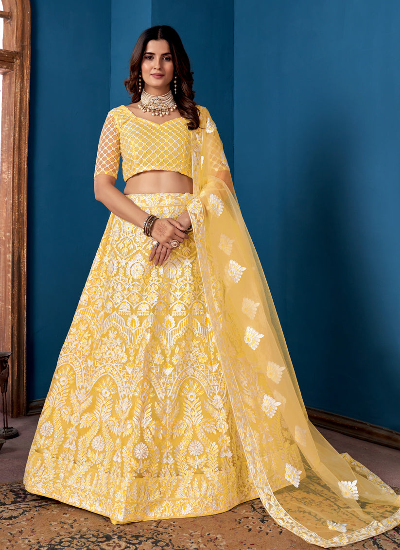 Lemon Yellow Net Embroidered Wedding Wear Lehenga Choli