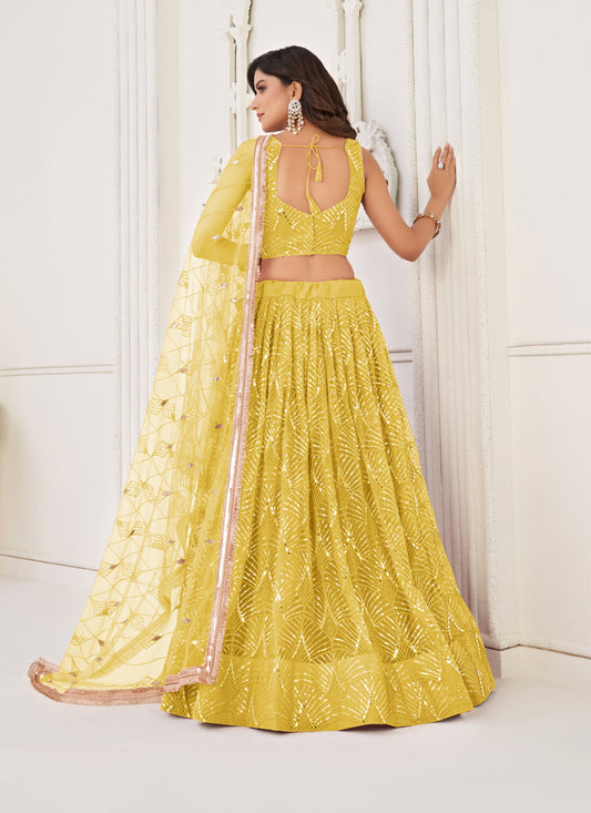 Maize Yellow Net Embroidered Lehenga Choli