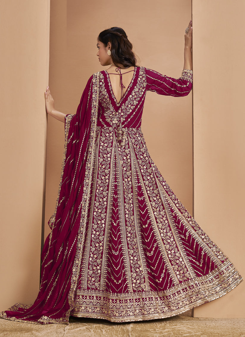 raspberry faux georgette heavy embroidered anarkali suit