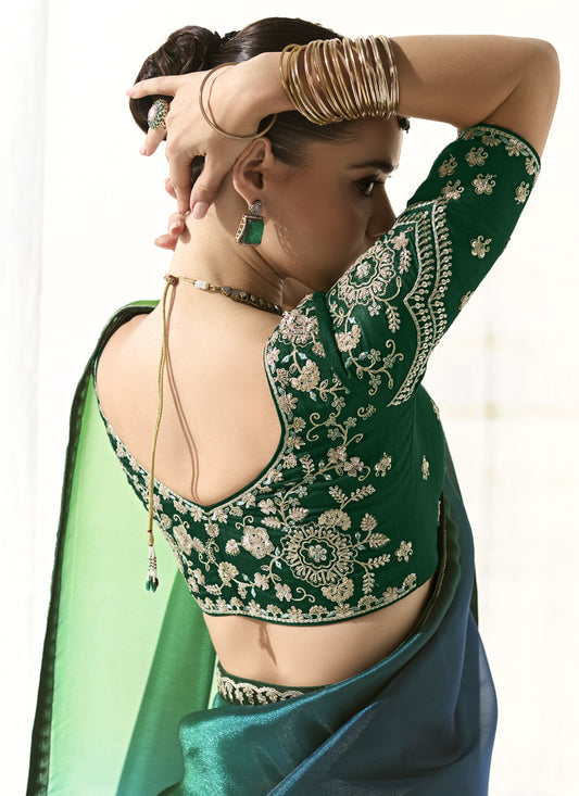 Awesome Emerald Green and Peacock Blue Tissue Embroidered Designer Wedding Saree