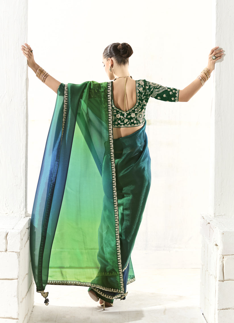 Awesome Emerald Green and Peacock Blue Tissue Embroidered Designer Wedding Saree