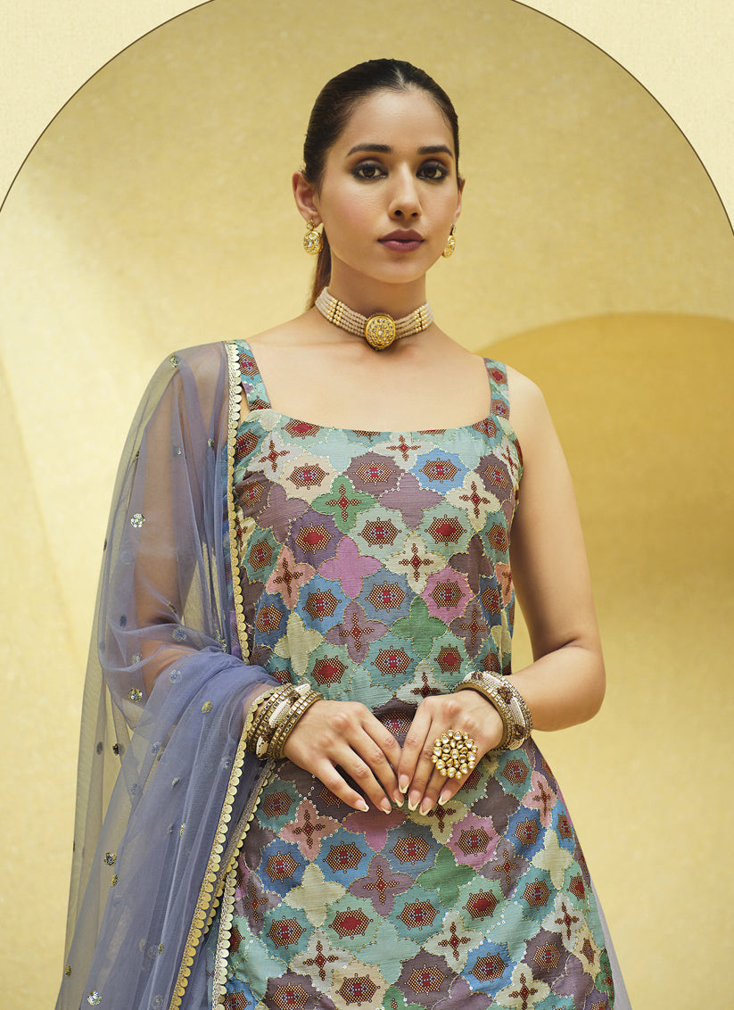 Fabulous Lavender Grey Chinnon Silk Embellished Designer Lehenga Kameez