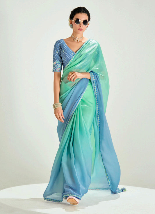 Fascinating Sea Green and Azure Blue Organza Tissue Embroidered Designer Wedding Saree