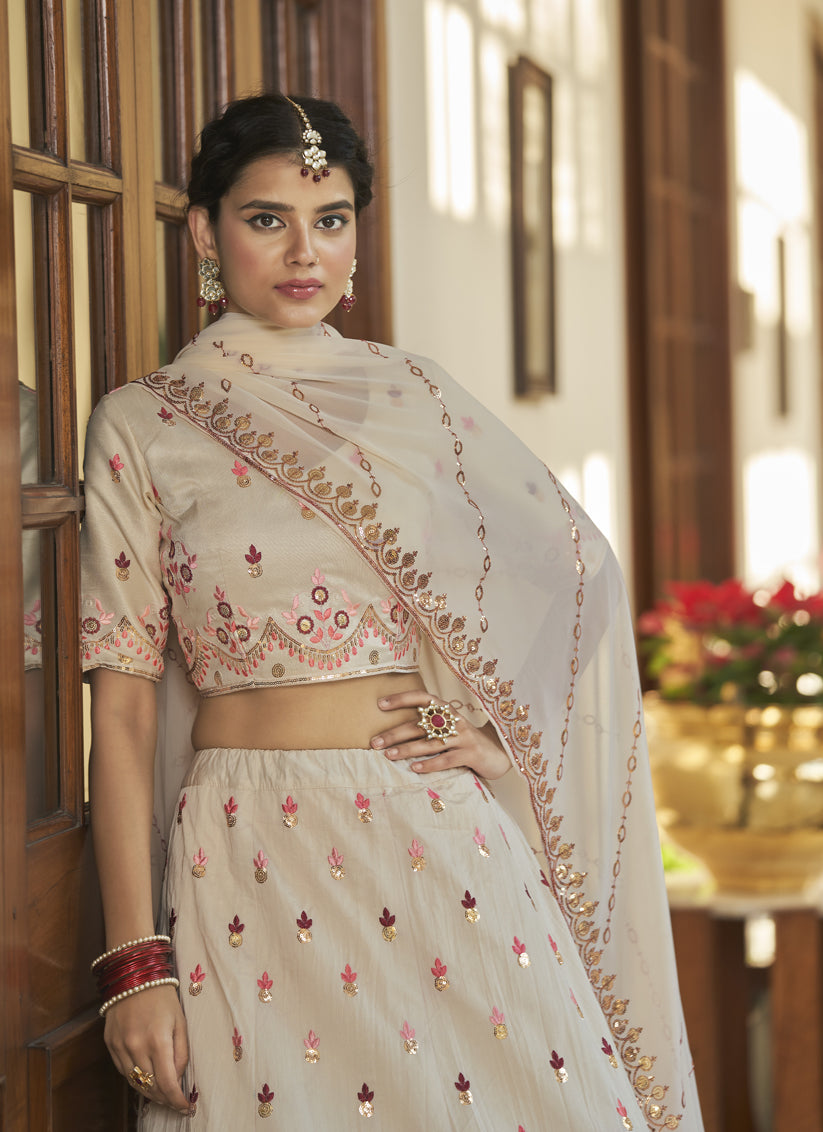 Magnetic Ivory and Maroon Art Silk Embroidered Wedding Lehenga Choli