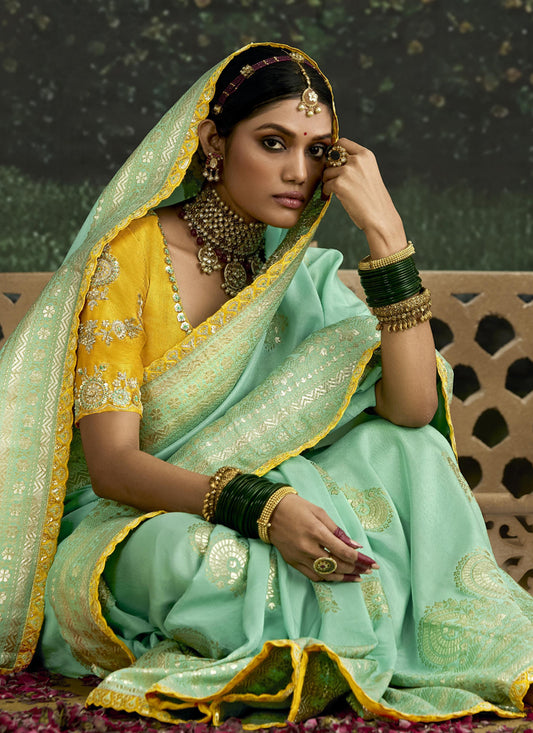 Voguish Turquoise Dola Silk Embroidered Wedding Saree