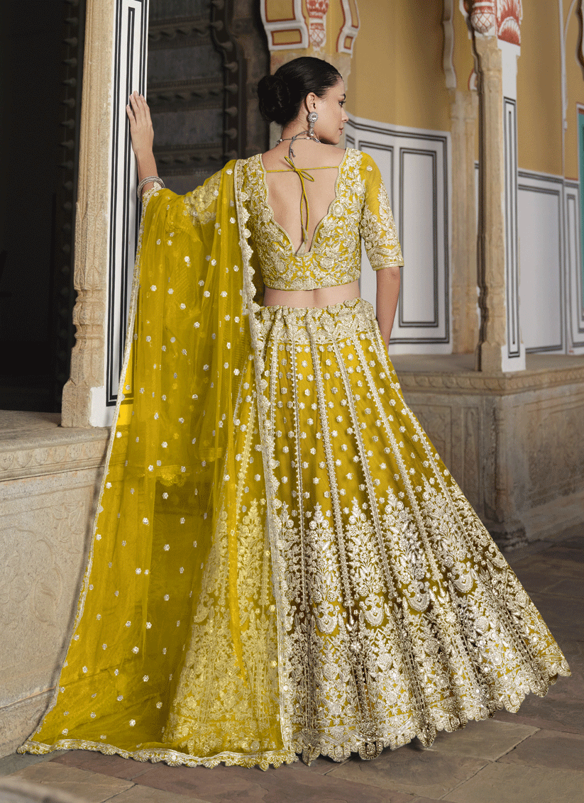 Lemon Yellow Net Embroidered Lehenga Choli