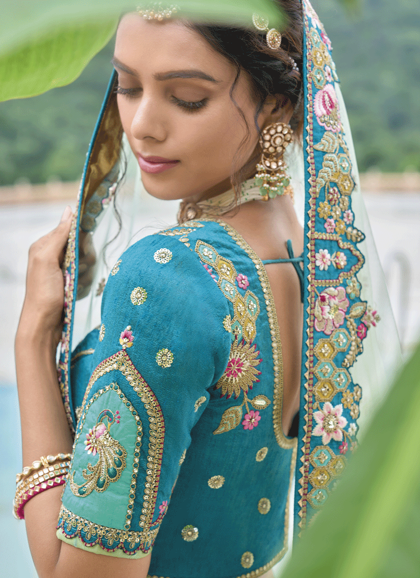 Alluring Mint Green Heavy Embroidered Silk Designer Lehenga Choli