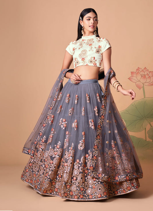 Luxurious Stone Grey Net Embroidered Designer Lehenga Choli