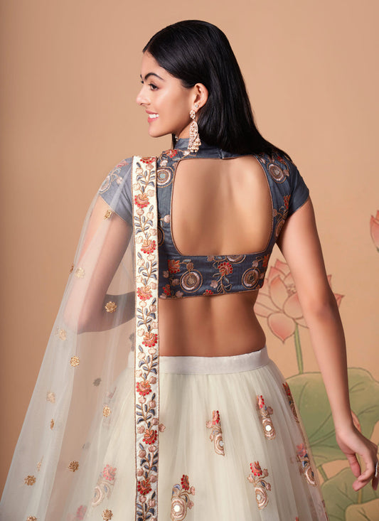 Impeccable Off White Net Embroidered Designer Lehenga Choli
