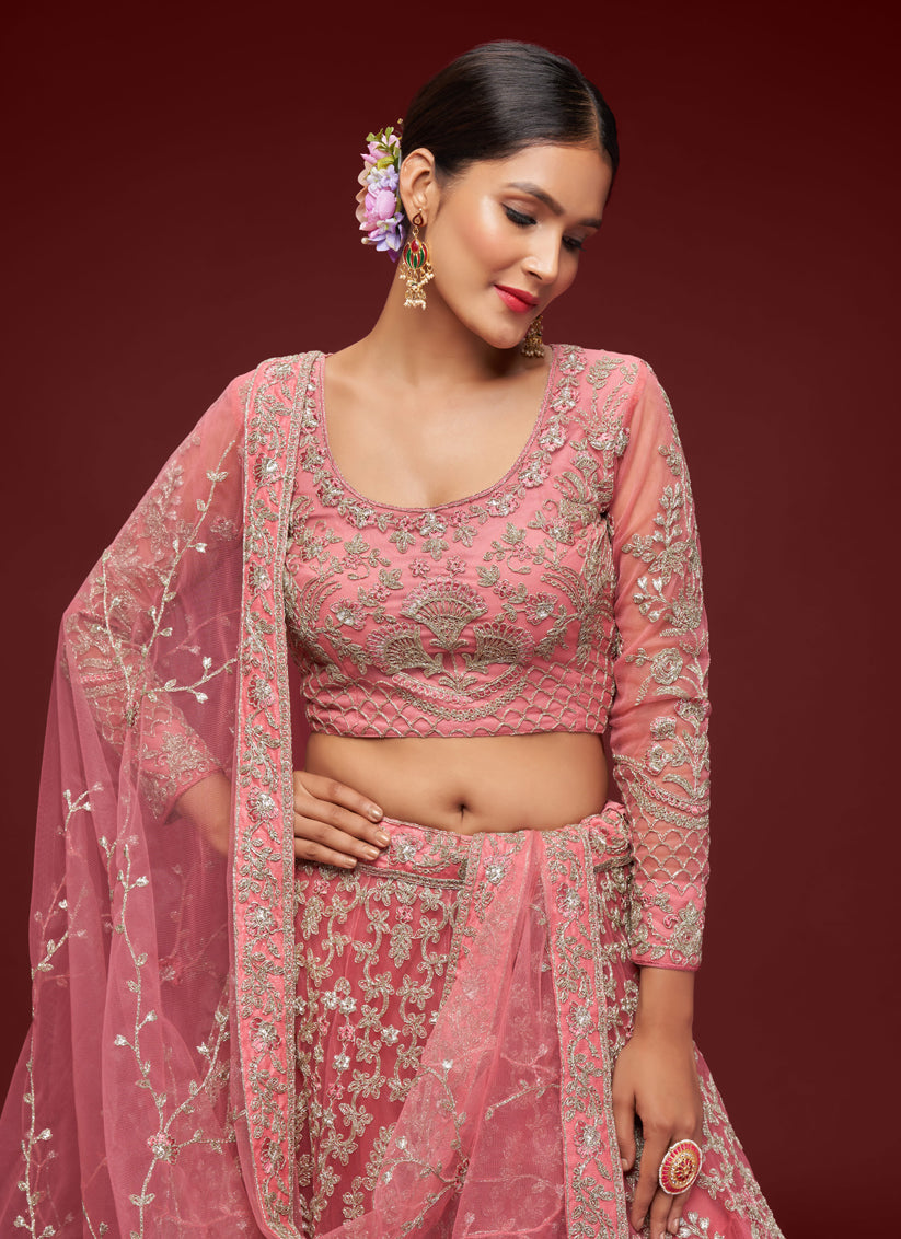 Impeccable Rose Pink Net Embroidered Designer Lehenga Choli