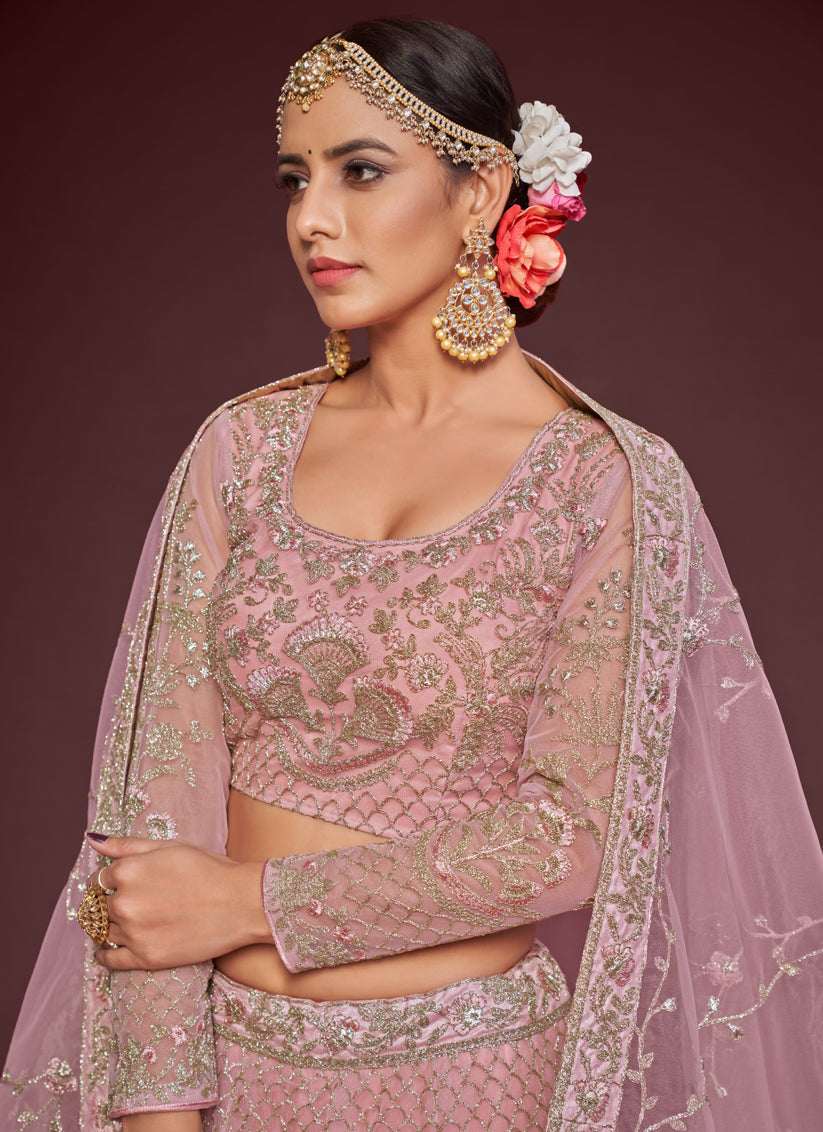Fascinating Pearl Pink Net Embroidered Designer Lehenga Choli