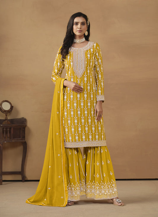 Mustard Faux Georgette Embroidered Sharara Kameez