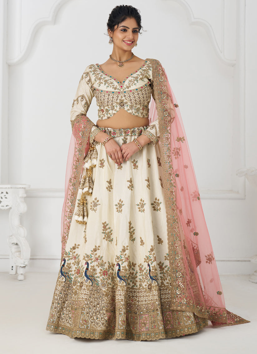 Fascinating Off White Heavy Embroidered Silk Bridesmaid Lehenga Choli