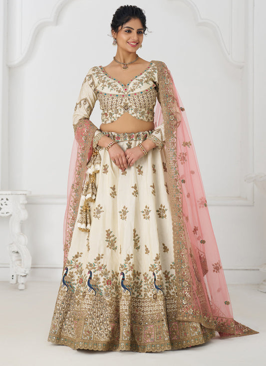 Fascinating Off White Heavy Embroidered Silk Bridesmaid Lehenga Choli