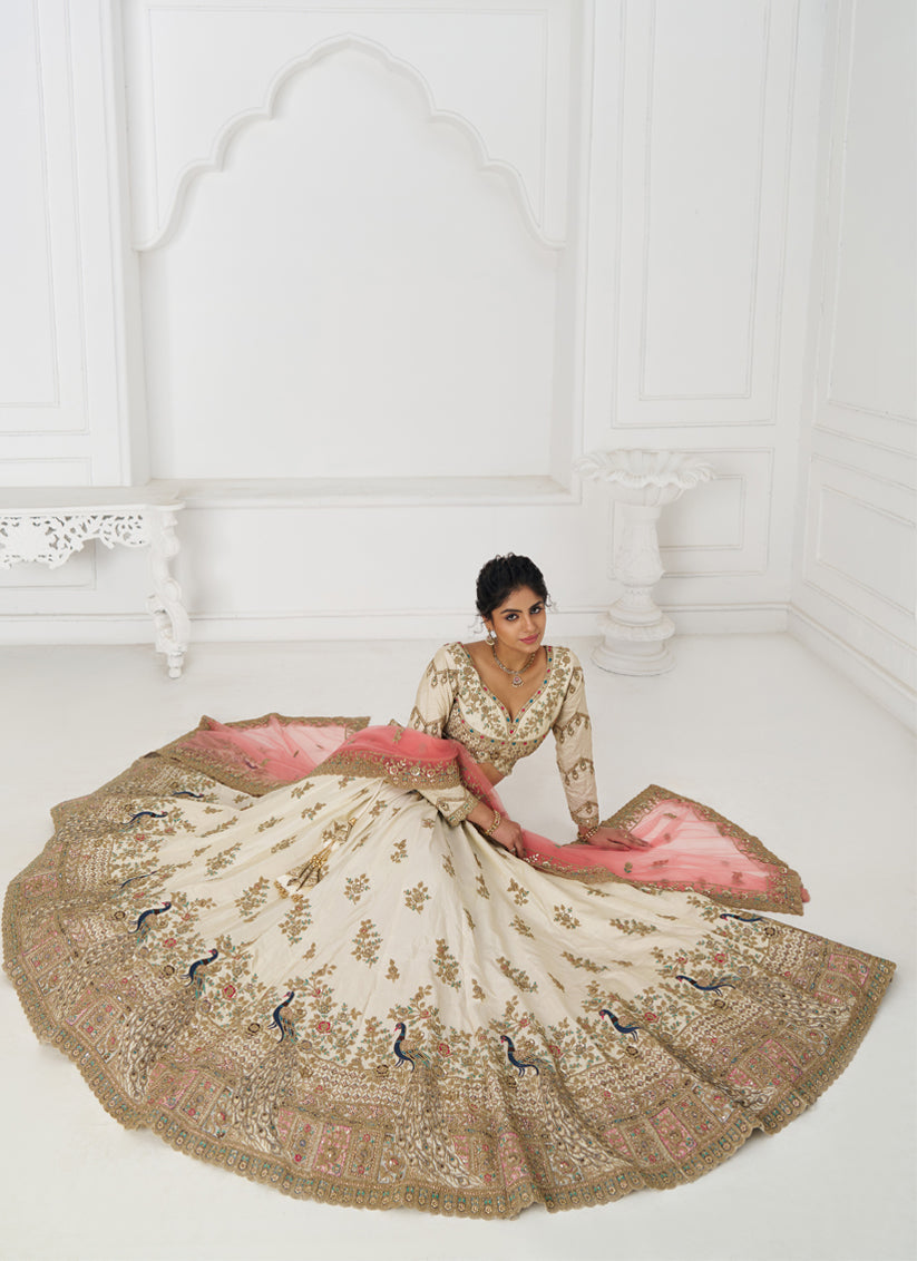 Fascinating Off White Heavy Embroidered Silk Bridesmaid Lehenga Choli