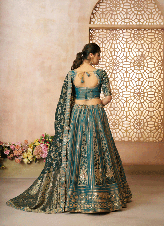 Glamorous Green Tissue Silk Wedding Wear Lehenga Choli