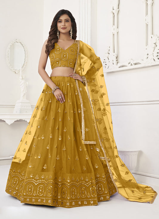 Mustard Net Embroidered Lehenga Choli