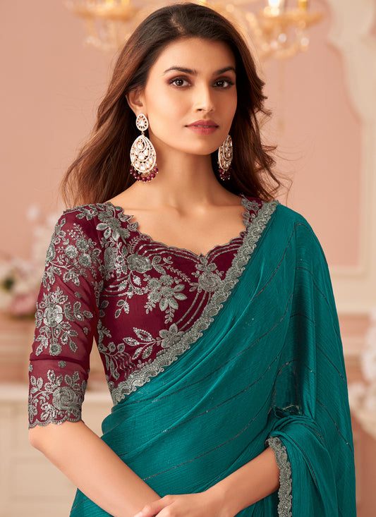 Ravishing Rama Green Embroidered Satin Party Wear Saree