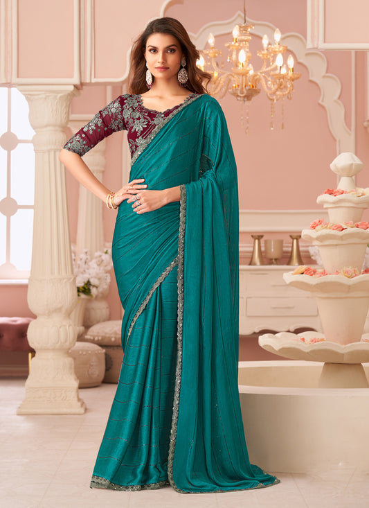 Ravishing Rama Green Embroidered Satin Party Wear Saree