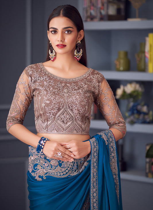 Sleek Peacock Blue Satin Silk Embroidered Designer Wedding Saree