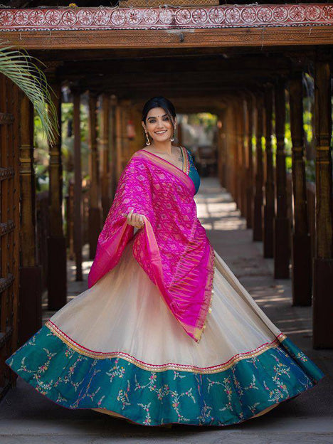 Off White and Teal Blue Heavy Taffeta Silk Embroidered Chaniya Choli