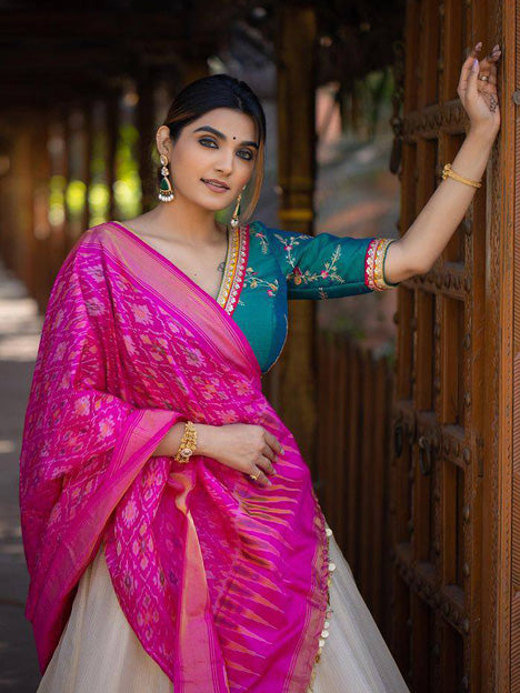 Off White and Teal Blue Heavy Taffeta Silk Embroidered Chaniya Choli