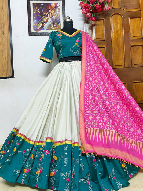 Off White and Teal Blue Heavy Taffeta Silk Embroidered Chaniya Choli