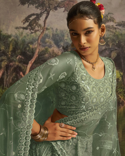 Captivating Sea Green Soft Embroidered Net Designer Wedding Lehenga Choli Set