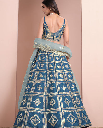 peacock blue art silk embroidered lehenga choli with net dupatta
