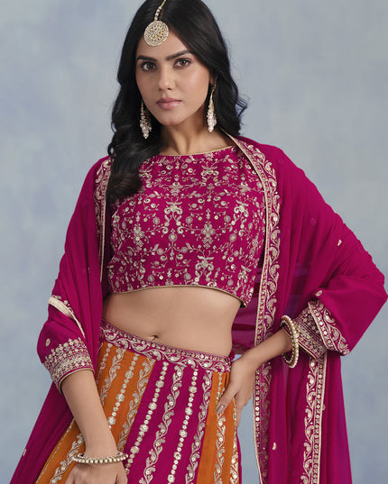 magenta and tangerine faux georgette embroidered lehenga choli