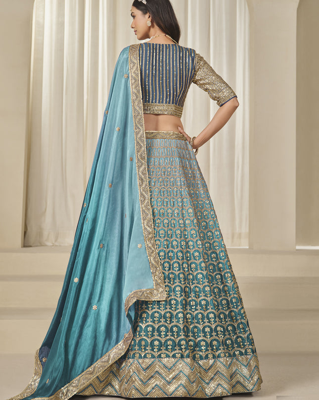 Bewitching Teal Blue Heavy Embroidered Premium Chinnon Silk Lehenga Choli Set