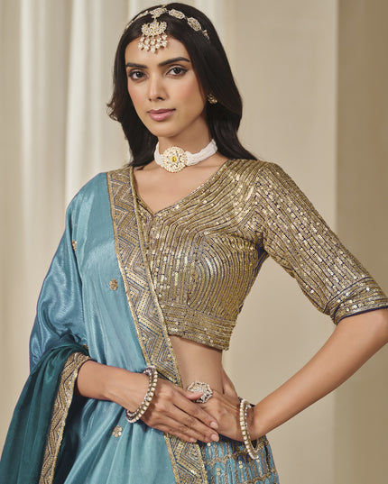 Bewitching Teal Blue Heavy Embroidered Premium Chinnon Silk Lehenga Choli Set